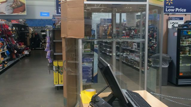 ... Man charged after shattering case, trying to steal guns from Walmart