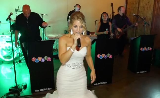 Nicole Papay rocks the house on her wedding day - KCTV5